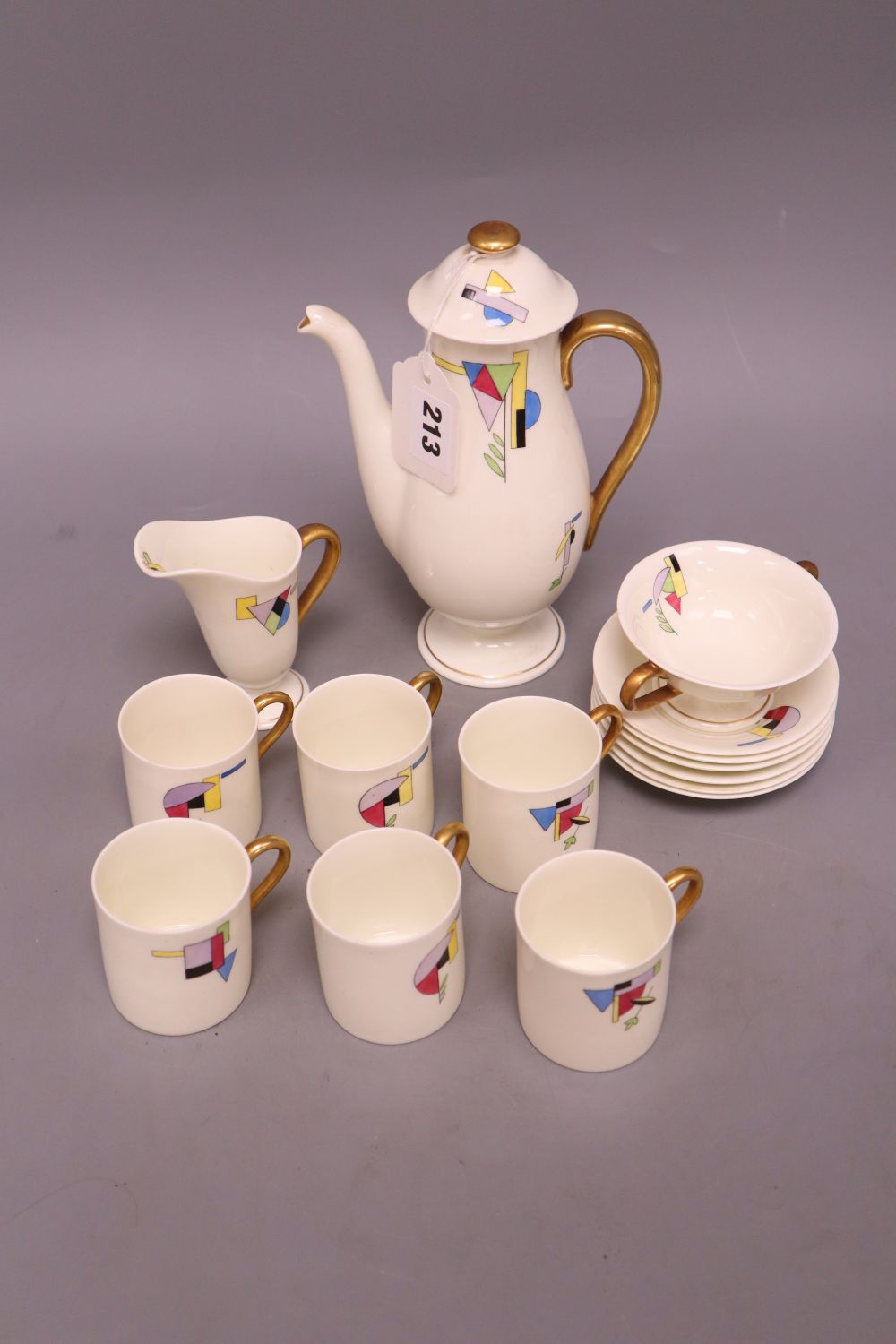 A Royal Doulton Art Deco porcelain coffee set, with geometric pattern, coffee pot 20.5cm